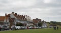 Whitstable view, old town, charming shops, cafes in traditional buildings. Kent, England. Street view green park near