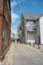 Whitstable view, old town, charming shops, cafes in traditional buildings. Kent, England. Street view local British