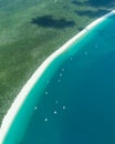 Whitsunday coastline rainforest aerial with boats