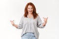 Who boss me. Self-assured upbeat triumphing middle-aged lucky redhead woman pointing herself proudly smiling toothy Royalty Free Stock Photo