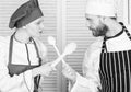 Who cook better. Ultimate cooking challenge. Culinary battle of two chefs. Couple compete in culinary arts. Kitchen Royalty Free Stock Photo