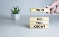 Who Do You Know text on wooden cubes, business concept.