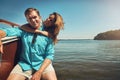 Because who doesnt enjoy a relaxing boat ride. Portrait of a young couple spending time together on a yacht. Royalty Free Stock Photo