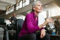 Who needs the fountain of youth if we have fitness. Portrait of a happy senior woman drinking water and taking a break Royalty Free Stock Photo