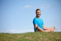 Who needs stress. Full length shot of a handsome mature man doing yoga outdoors. Royalty Free Stock Photo