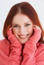 Who says pink and red dont match. Portrait of a young woman in a pink jersey.