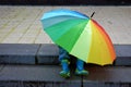 Who is under the umbrella, boy or girl? Royalty Free Stock Photo