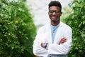 Who wouldnt love working in the fresh open air. Portrait of a handsome young botanist posing with his arms folded Royalty Free Stock Photo