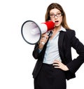 Who you calling bossy. a young businesswoman using a megaphone against a studio background. Royalty Free Stock Photo