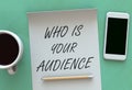 WHO IS YOUR AUDIENCE, message on paper, smart phone and coffee