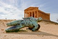 The whole Ancient Statue of the Fallen Icarus in the front of the Tempio della Concordia in Valley of the Temples near Agrigento, Royalty Free Stock Photo