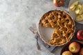 Whole apple pie, homemade fresh fruit pie with red apples. Copy space. Royalty Free Stock Photo