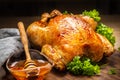 Whole baked chicken with crusty skin glazed with honey on top and parsley on the side