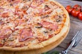 Whole baked pizza with bacon Royalty Free Stock Photo