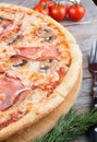 Whole baked pizza with bacon Royalty Free Stock Photo