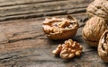 Whole big peeled walnut kernel with thin shell on wooden background Royalty Free Stock Photo