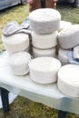 Whole big wheels of natural wool rolls used for the production of woolen socks Royalty Free Stock Photo