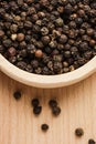 Whole black peppercorns Royalty Free Stock Photo