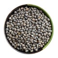 Whole black urad beans in round bowl isolated Royalty Free Stock Photo