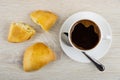 Whole, broken sochnik pies with cottage cheese, coffee, spoon