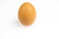 Whole brown hens egg on a white background Royalty Free Stock Photo