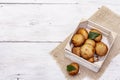 Whole brown royal champignon mushrooms in crafted wooden crate Royalty Free Stock Photo