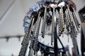 A whole bunch of various drill bits are hanging from a rack Royalty Free Stock Photo