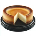 A whole cheesecake with a slice missing Royalty Free Stock Photo