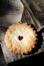 Whole cherry pie with heart shape in pastry crust Royalty Free Stock Photo