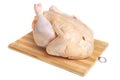 A whole chicken carcass on a cutting board, isolate on a white background. Natural farm chicken Royalty Free Stock Photo