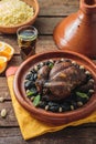 Whole chicken tajine, moroccan food, close view.