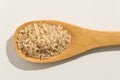 Whole Chinese Rice seed. Nutritious grains on a wooden spoon on Royalty Free Stock Photo