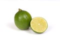 Whole citrus lime and half on the white background.