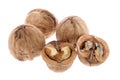 Whole and cracked walnuts isolated on white background Royalty Free Stock Photo