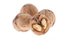 Whole and cracked walnuts isolated on white background Royalty Free Stock Photo