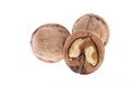 Whole and cracked walnuts isolated on white background Royalty Free Stock Photo