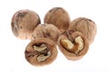 Whole and cracked walnuts isolated on white background Royalty Free Stock Photo