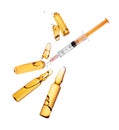 Whole and crushed ampoules with a syringe in the air isolated on a white background Royalty Free Stock Photo