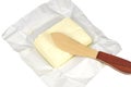 Whole cube of butter and wooden knife