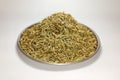 Whole cumin seeds isolate white background.