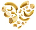 Whole and cut bananas in the shape of a heart on a white background Royalty Free Stock Photo