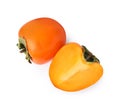 Whole and cut fresh persimmons isolated on white, top view Royalty Free Stock Photo