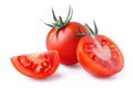 Whole and cut fresh, red tomatoes isolated on white background. Clipping path. Full depth of field Royalty Free Stock Photo