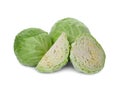 Whole and cut fresh ripe cabbages on white background Royalty Free Stock Photo