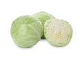 Whole and cut fresh ripe cabbages on white background Royalty Free Stock Photo