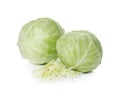 Whole and cut fresh ripe cabbages on white background Royalty Free Stock Photo