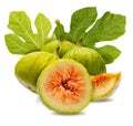 Whole and cut green figs, with fig leaves. Royalty Free Stock Photo