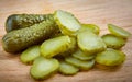 Whole and cut pickled cucumbers. Salted cucumbers