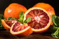 Whole and cut ripe juicy Sicilian Blood oranges Royalty Free Stock Photo