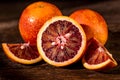 Whole and cut ripe juicy Sicilian Blood oranges Royalty Free Stock Photo